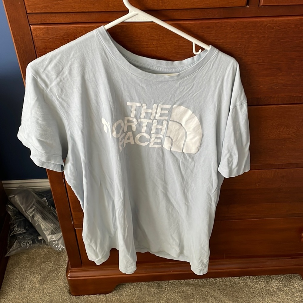 Light blue north face shirt